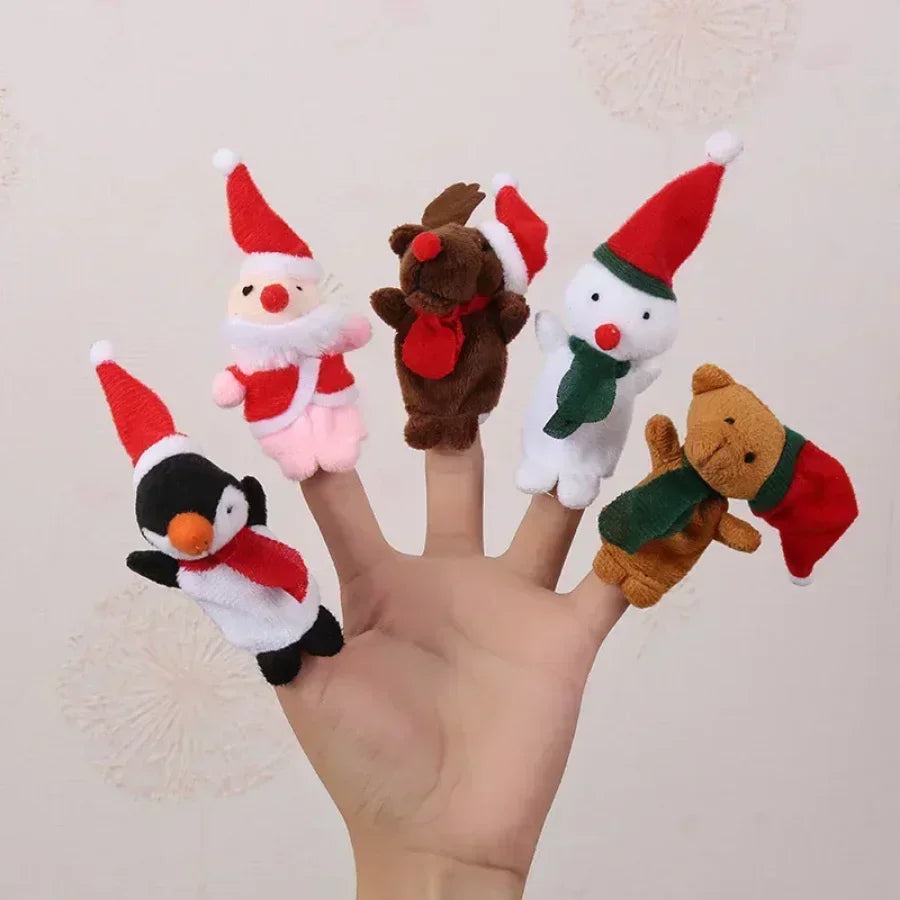 5 animal finger puppets in christmas hats and scarves on a person's hand