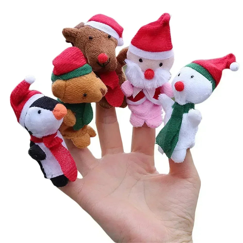 5 animal finger puppets in christmas colored hats and scarves on a person's hand.